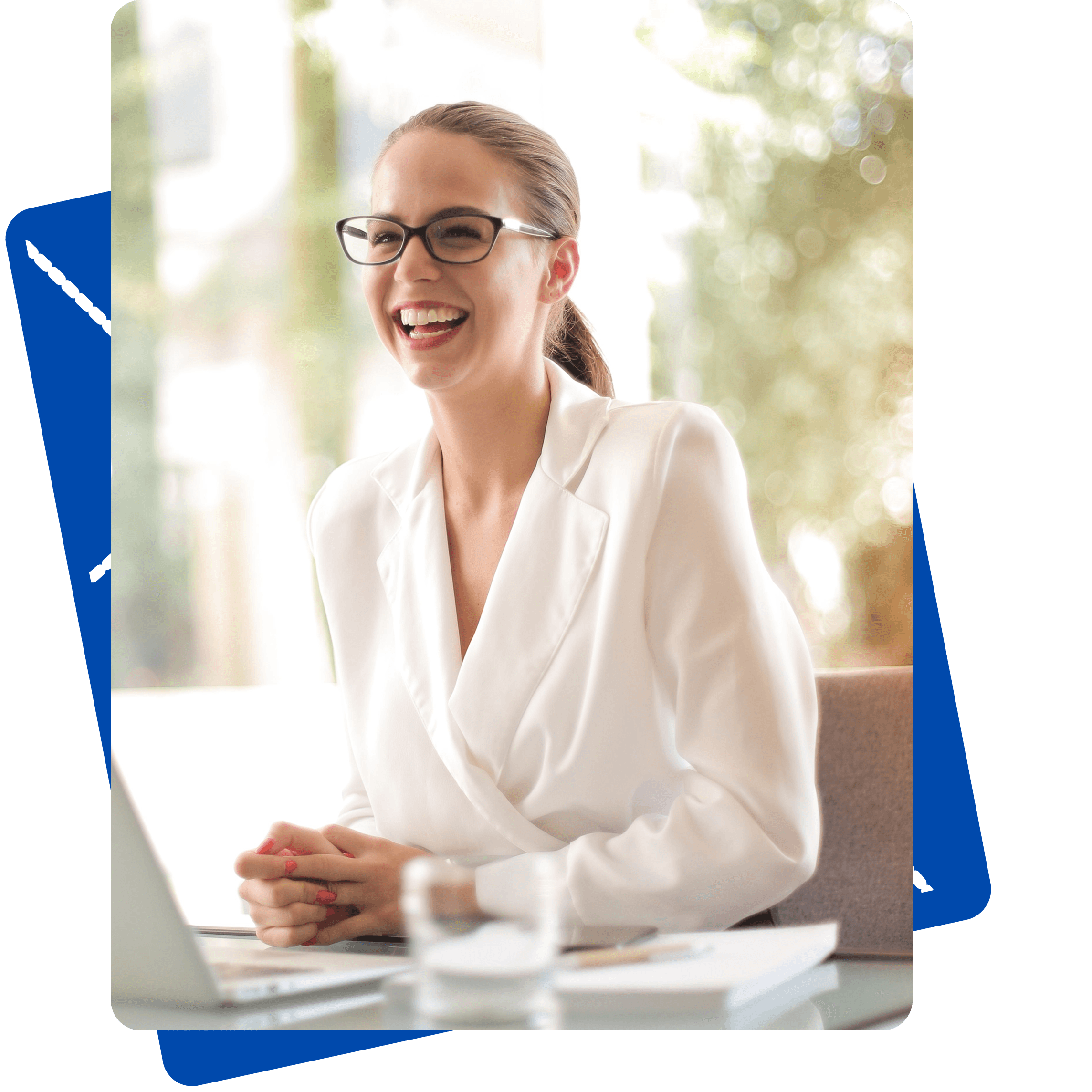 Professional smiling at her desk